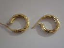 2 örhängen  18k     vikt:1,4gr