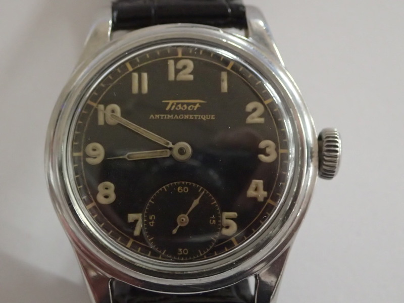 Armbandsur Tissot med svart tavla      D:31mm