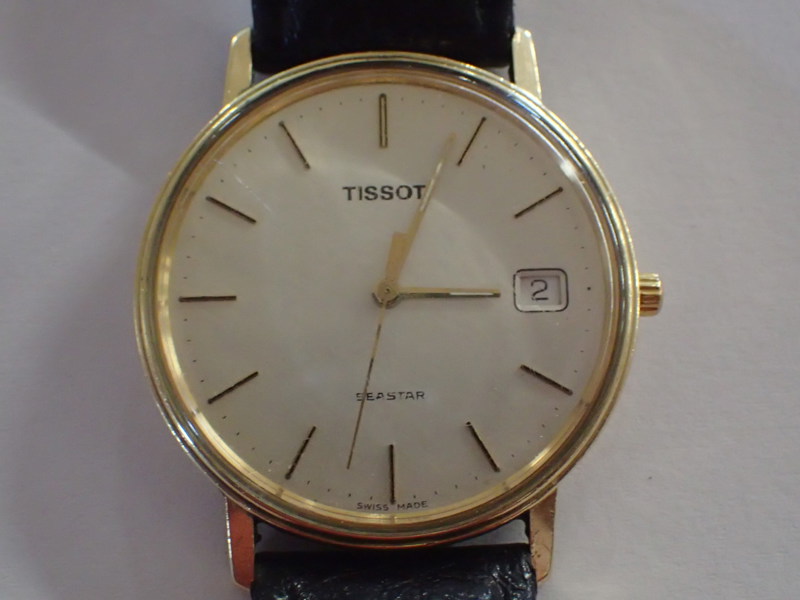 Armbandsur Tissot 18k med ask