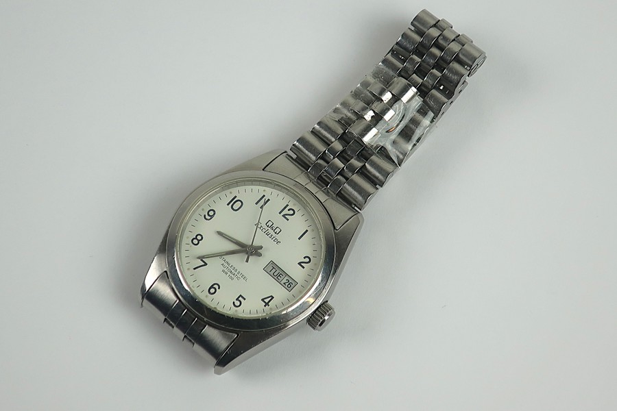 ARMBANDSUR. Q&Q EXCLUSIVE AUTOMAT WL100.