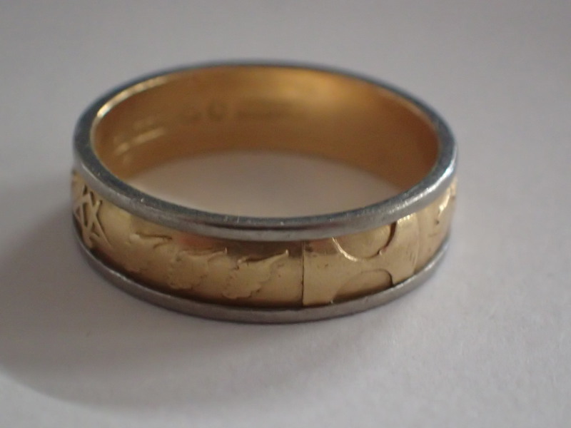 Ring 18k rött/vitt guld  vikt:6,9gr