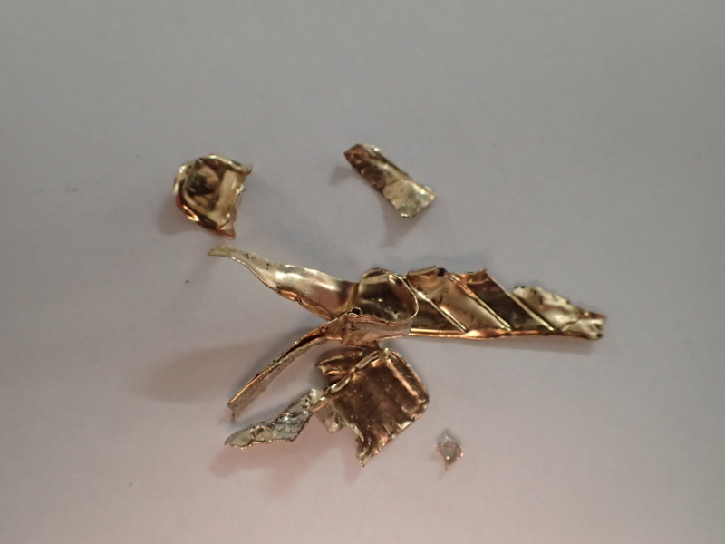 Guldskrot 18k vikt:1,2gr