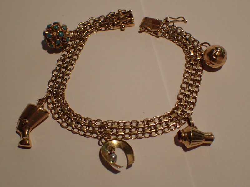 Armband 18k  x-länk med berlocker