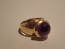 Ring 18k med lila sten   vikt:4,8gr