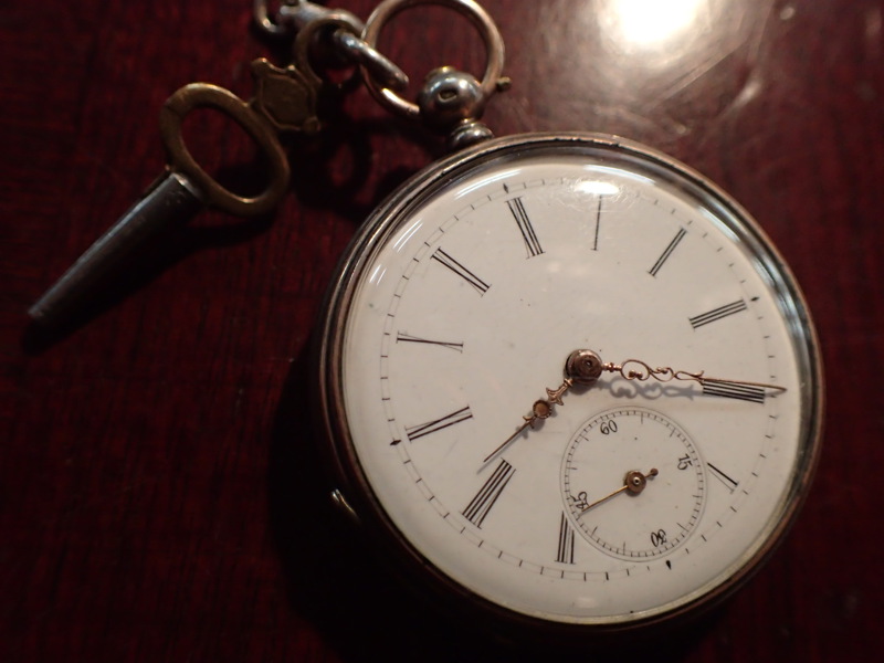 Fickur i silver med oäkta kedja