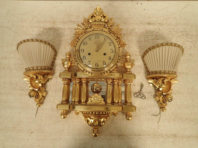 Väggpendyl med lampetter