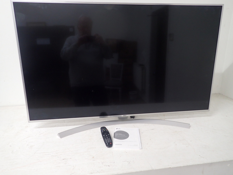 TV,  LG  55" med bok
